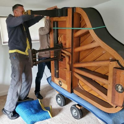 Piano Moving Art & Piano Storage